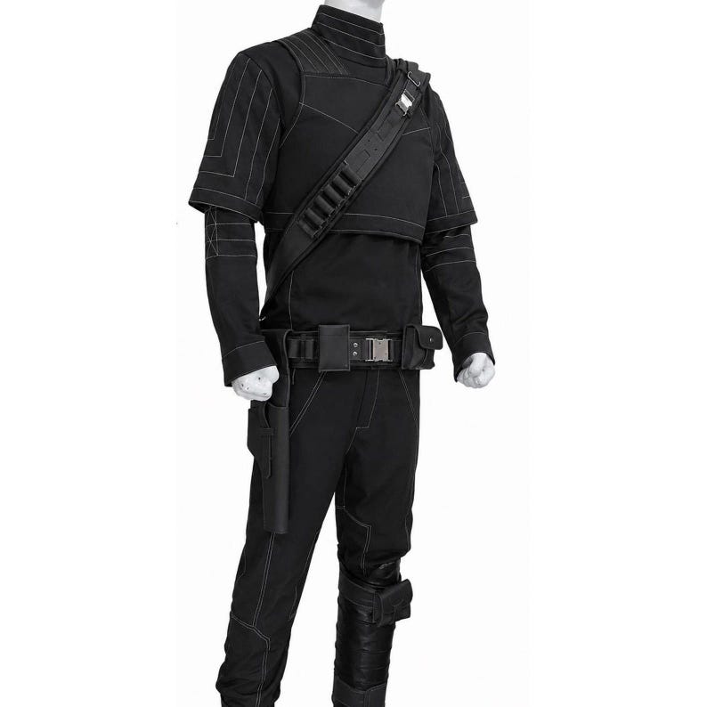 Mandalorian Flight Suit Costume featuring custom tailored shirt, pants, vest and belt with detailed construction and professional craftsmanship. Star Wars inspired bounty hunter cosplay outfit designed for comfort, durability and authentic appearance. Ideal for conventions, cosplay events, photoshoots and collectors. High-quality materials, precise stitching, realistic design and custom sizing create a premium costume experience with screen-inspired details and exceptional attention to quality.