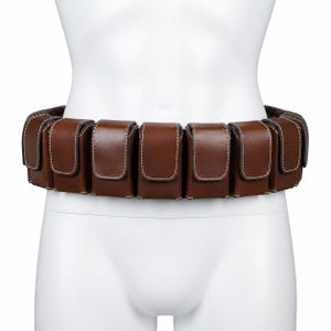 Handmade Boba Fett leather utility belt displayed on a white mannequin torso, featuring detailed ammo pouches and premium genuine leather craftsmanship. Mandalorian inspired cosplay belt perfect for Comic Con, cosplay events, sci fi conventions, collector displays, fan films, Halloween costumes, and custom bounty hunter outfits. Adjustable leather costume accessory with screen inspired design, durable construction, authentic pouch details, and professional cosplay quality.