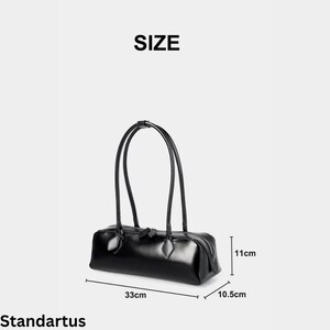 May include: A black rectangular handbag with two curved handles. The bag is 33cm long, 10.5cm wide, and 11cm high. The word "SIZE" is at the top of the image. The brand name "Standartus" is at the bottom.