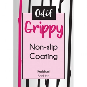 May include: A pink and white can of Odif Grippy Non-slip Coating. The can has a black and white tree design and the text "Resistant Acid free" on it. Made in France.