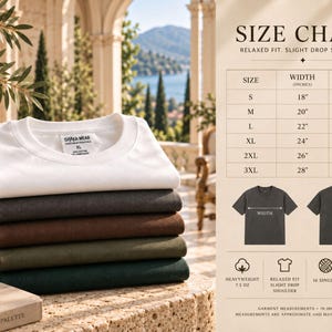 May include: A stack of five folded t-shirts in white, charcoal, brown, olive, and dark green. Next to the shirts is a size chart with columns for size, width in inches, and length in inches, plus icons for heavyweight 7.5 oz fabric and relaxed fit.
