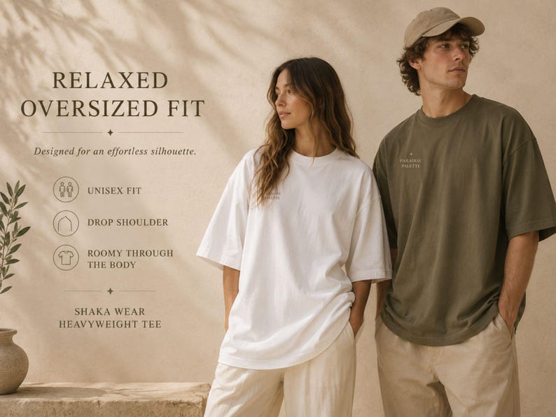 May include: A white and an olive green heavyweight t-shirt with a relaxed, oversized fit, drop shoulders, and a roomy body. The text on the image reads: RELAXED OVERSIZED FIT, Designed for an effortless silhouette, UNISEX FIT, DROP SHOULDER, ROOMY THROUGH THE BODY, SHAKA WEAR HEAVYWEIGHT TEE.