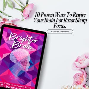 May include: A tablet displays the title "Brighter Brain" with a brain graphic, set against a geometric pink and purple background. The text "10 Proven Ways To Rewire Your Brain For Razor Sharp Focus" is above the tablet. Pink flowers are in the background.