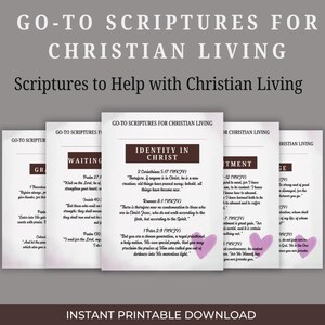 May include: A collection of printable scripture cards titled "Go-To Scriptures for Christian Living." The cards feature text excerpts and are arranged in a fan shape. The cards have a white background with a brown header and are decorated with purple hearts.