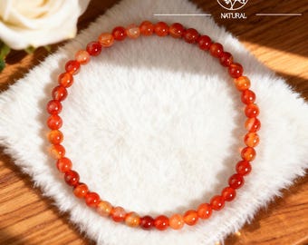 Pulsera delicada de cornalina, ágata roja natural y cristal curativo.