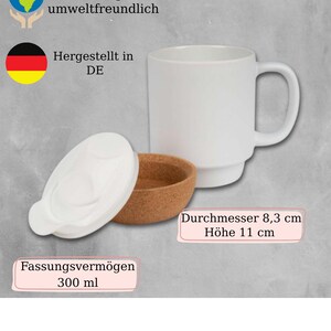 May include: A white ceramic mug with a handle, a white lid, and a cork base. The mug has a diameter of 3.27 inches and a height of 4.33 inches. The capacity is 10.14 fluid ounces.