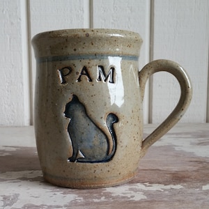 Personalized gift for #CatLover . Gift a special someone with a cozy stoneware mug that will help keep hot drinks hot and cold drinks cold.