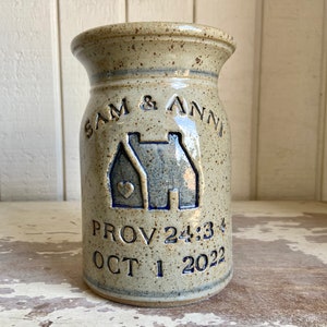 Personalized Stoneware Marriage Crock shown with double  bottom line #HeartInHome logo