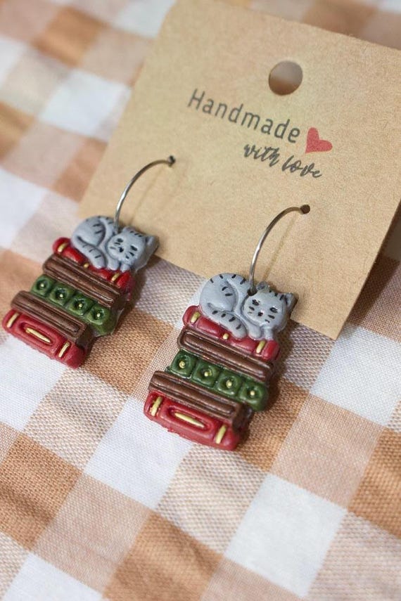 cats sleeping on books polymer clay earrings