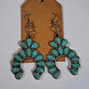 Turquoise stone squash blossom dangle earrings