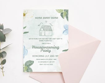 May include: A housewarming party invitation with a watercolor design. The invitation features the text "Home Sweet Home" and "Housewarming Party". The invitation is light blue with floral accents and is paired with a pink envelope.
