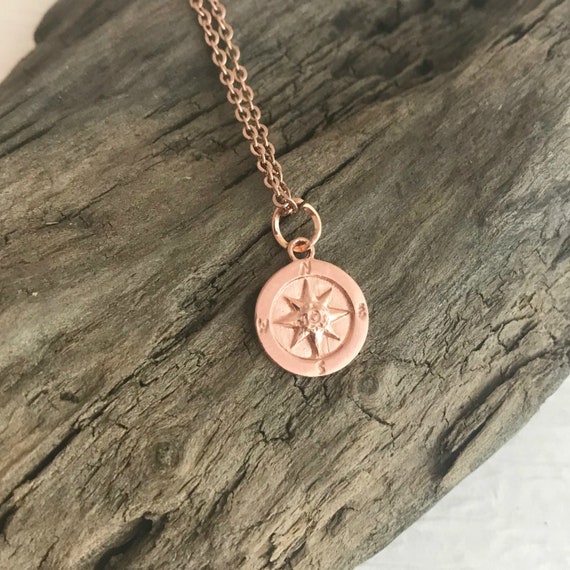 rose gold compass pendant