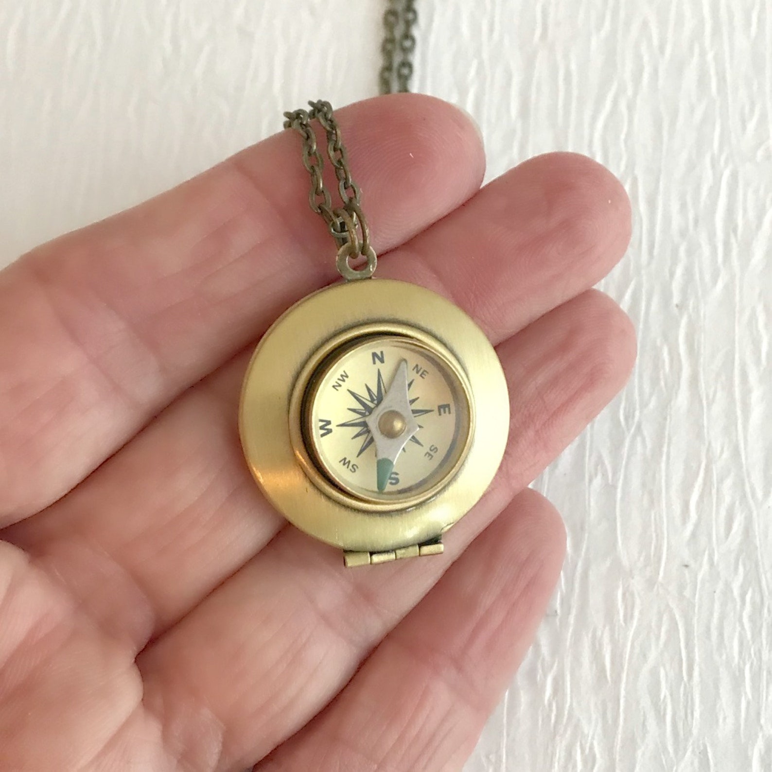Gold compass locket Clearance