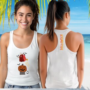 May include: White tank top with a Halloween-themed design. The front features a cartoon pumpkin, witches, and bats. The back of the tank top has the word "HALLOWEEN" in orange and yellow vertical text.
