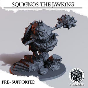 May include: A gray 3D-printed figurine of Squignos the Jawking, a fantasy creature with a crown, shield, and spiked mace. The figure stands on a stone base with the text "PRE-SUPPORTED" and the Diceverse logo.