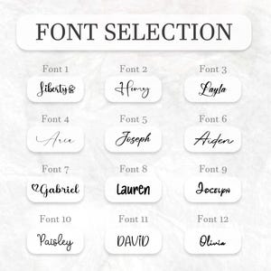 May include: A graphic displaying 12 font options for selection. Each font is shown with a sample name in a white rounded rectangle. The text "FONT SELECTION" is at the top. Font names include Liberty, Henry, Layla, Aria, Joseph, Aiden, Gabriel, Lauren, Jocelyn, Paisley, David, and Olivia.