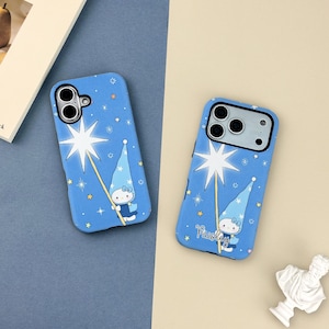 May include: Two blue phone cases with a whimsical design. Each case features a cartoon character holding a star wand, surrounded by stars. The word "Paisley" is written on one case.