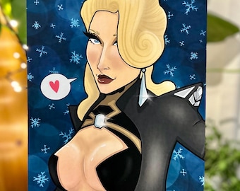 May include: Illustration of a woman with blonde hair, blue eyes, and a black outfit. The artwork features a speech bubble with a red heart on a blue background with snowflake designs. The woman is wearing a diamond earring.