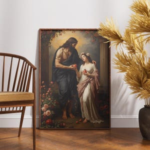 May include: A framed classical painting shows a man and woman in a garden. The man, in dark robes, offers a red fruit to the woman, who wears a white gown and floral crown. Roses and columns frame the scene, evoking a sense of classical art.