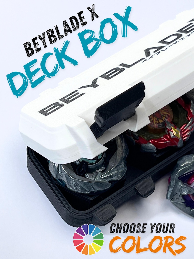 May include: White and black Beyblade X Deck Box with the text "BEYBLADE X DECK BOX" in black and teal. The box is open, revealing several Beyblades in red, gray, and purple. The text "CHOOSE YOUR COLORS" is also visible.