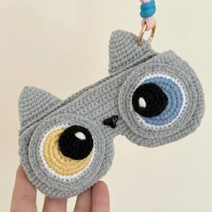 May include: A set of three ceramic nesting bowls in shades of blue, green, and white. The bowls feature a speckled glaze and a simple, modern design. The largest bowl measures approximately 6 inches in diameter.