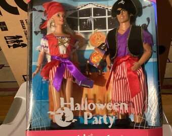 Premium AI Image | Barbie and Ken Stuns in Eerie Halloween Costumes