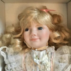 Porcelain Child Doll  15”  Mint in the Box  designed by Maryse Nicole  Doll