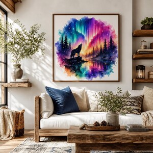 a large, colorful painting of a wolf standing on a rock, surrounded by a vibrant, rainbow-colored landscape with a lake and trees. The painting is hung on a wall above a white couch, which is decorated with various pillows and a vase of flowers. The room also includes a coffee table, shelves, and a potted plant, creating a cozy and inviting atmosphere.