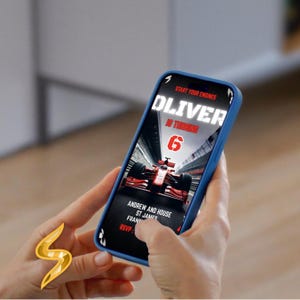 Peut inclure: Un smartphone bleu affiche une invitation d'anniversaire sur le th&egrave;me des voitures de course. L'invitation indique "Oliver a 6 ans" avec une image de voiture de course rouge. Le t&eacute;l&eacute;phone est tenu dans les mains d'une personne.
