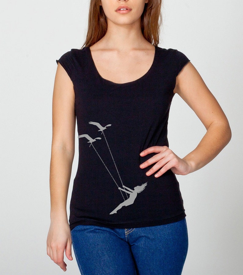 Womens flying bird swing on womans wide neck shirt, capped sleeves, American Apparel black, available in s,m,l,xl Worldwide Shipping image 1