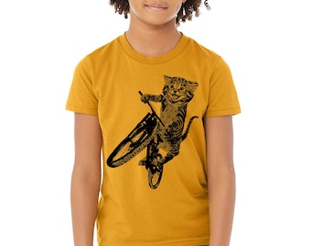 Cat Riding Bicycle Wheelie Kids T-Shirt: Kitten On Bike Graphic Tee