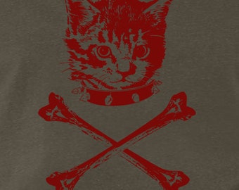 May include: Red graphic of a kitten wearing a studded collar, with crossed bones beneath. The kitten's face is detailed, and the design has a distressed, vintage look. The image is on a muted gray-green background.