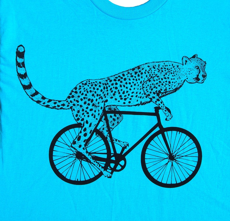 mens cheetah on a bike t shirt American Apparel turquoise, available in S, M, L, XL, XXL WorldWide Shipping image 1