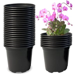 May include: A stack of black plastic plant pots next to a pot filled with a flowering orchid. The orchid has vibrant pink flowers and green leaves. The pots are round with a ridged design and are suitable for various plants.