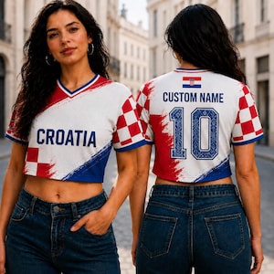 May include: A white, red, and blue cropped t-shirt featuring a checkered pattern, the text CROATIA on the front, and the text CUSTOM NAME with the number 10 on the back. The design includes a small Croatian flag graphic on the upper back.