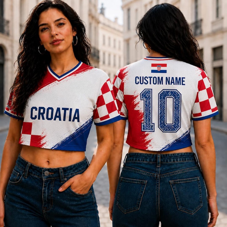 May include: A white, red, and blue cropped t-shirt featuring a checkered pattern, the text CROATIA on the front, and the text CUSTOM NAME with the number 10 on the back. The design includes a small Croatian flag graphic on the upper back.