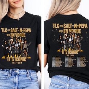 May include: A black t-shirt featuring a graphic print of the TLC, Salt-N-Pepa, and En Vogue tour. The front displays the artists and the text "TLC AND SALT-N-PEPA WITH EN VOGUE IT'S ICONIC THE TOUR". The back lists tour dates and locations.