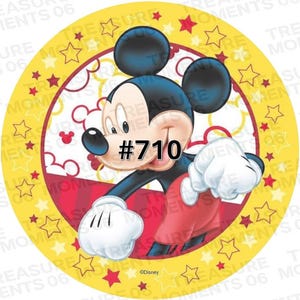 May include: A round, yellow Mickey Mouse-themed graphic with a red and white interior design. Mickey Mouse is depicted in his classic pose, wearing red shorts, white gloves, and black shoes. The number "#710" is displayed on the image.