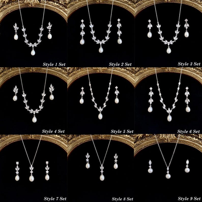 May include: A collection of nine jewelry sets, each featuring a silver-toned necklace and matching drop earrings with clear stones and white pearls. Each set is labeled Style 1 Set through Style 9 Set, showcasing various leaf-inspired designs.