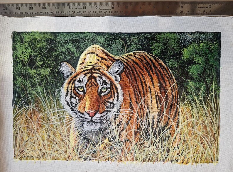May include: A detailed painting of a tiger in a grassy field. The tiger has orange and black stripes, with a white face and chest. The background features green foliage and tall, dry grass.