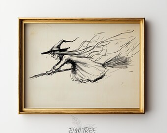 May include: A framed art print featuring a black ink sketch of a witch flying on a broomstick. The drawing shows a figure in a pointed hat with flowing robes and hair trailing behind. The frame is gold-toned and rectangular. Text reads ELM TREE PRINTS.