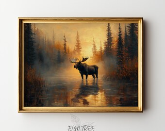 May include: A framed art print featuring a moose standing in a misty lake surrounded by trees. The artwork has a warm color palette with gold and brown tones. The text "ELM TREE PRINTS" is at the bottom.