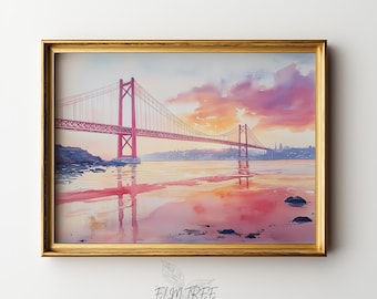 May include: Watercolor painting of a red suspension bridge over water, framed in gold. The sky is a blend of pink, orange, and purple hues. The water reflects the bridge and sky. The print is labeled "ELM TREE PRINTS".