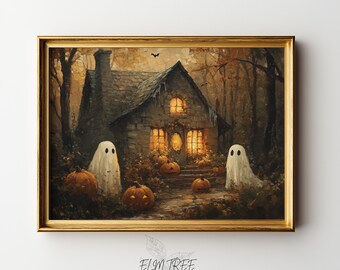 May include: A framed wall art print featuring a stone cottage in a forest at night with two white ghost figures, several orange pumpkins on the ground, and a small bat in the sky. The text ELM TREE PRINTS is visible below the gold-colored frame.