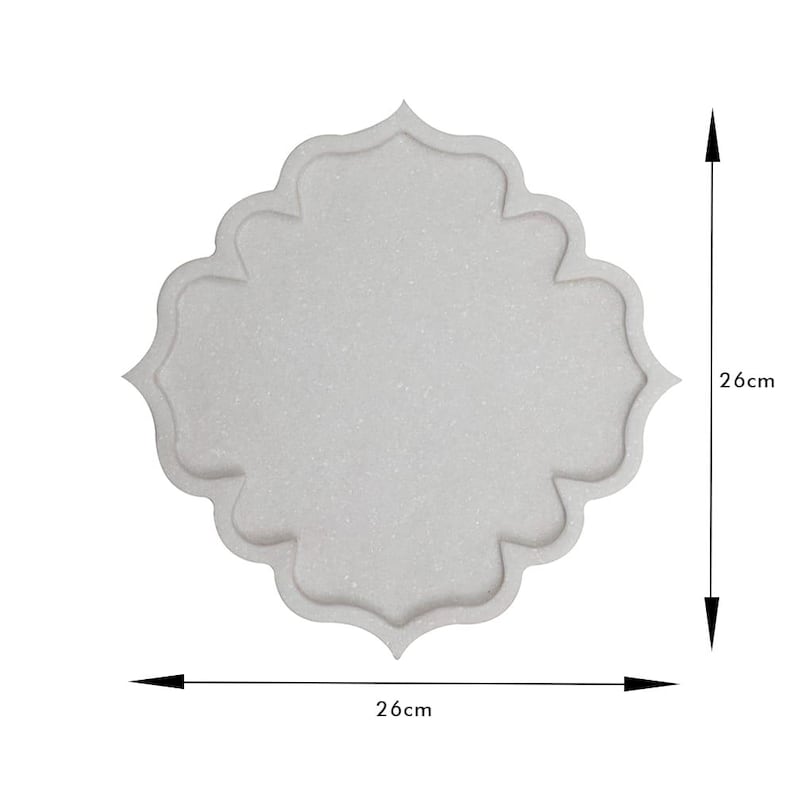 May include: A light gray decorative tray with a scalloped edge. The tray is 26 cm (10.2 inches) wide and 26 cm (10.2 inches) tall. The tray has a textured surface and a symmetrical design.