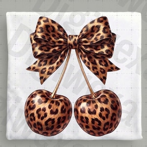 May include: A digital illustration of two cherries with a bow. The cherries and bow feature a leopard print pattern in shades of brown and tan. The stems are gold, and the background is white.