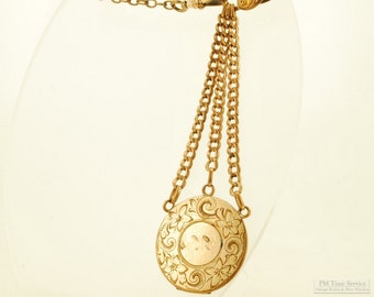 Vintage 5.5" yellow gold (filled) multi-strand ribbon-style chain, engraved round medallion finial