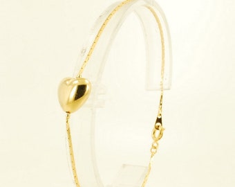 8" yellow gold plated snake-style link bracelet with a puffed heart accent