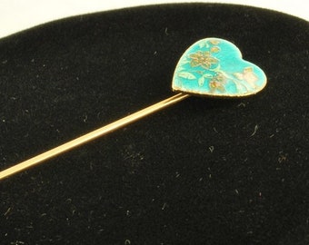 Cloisonne heart vintage stick pin, golden flowers & green foliage on turquoise blue background