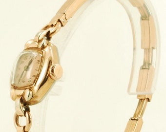 Gruen Guildite vintage ladies' wrist watch, 15 jewels, lovely rose gold (filled) & stainless steel oval case